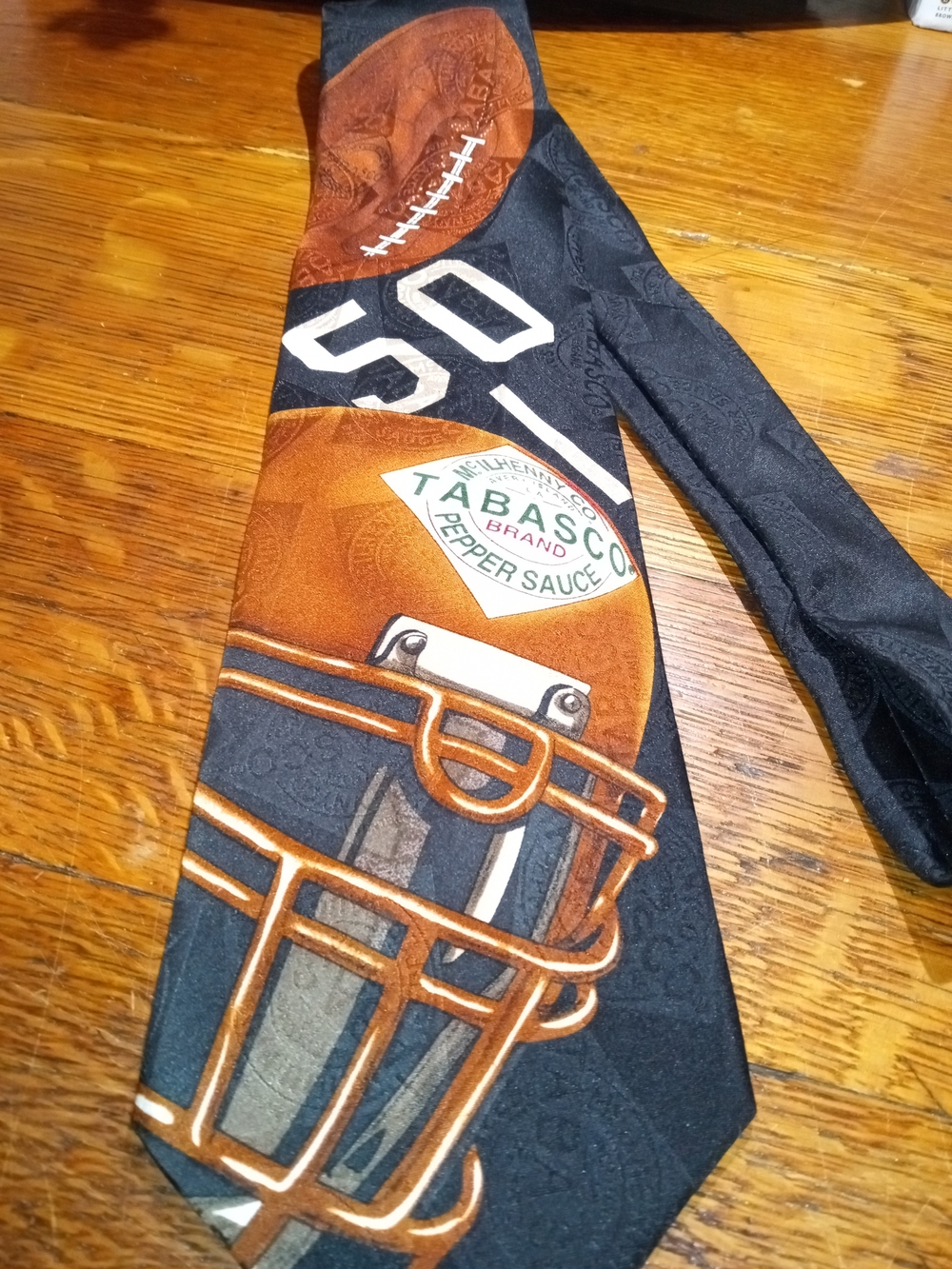 Tabasco Black Tie with Brown Football Helmet Design